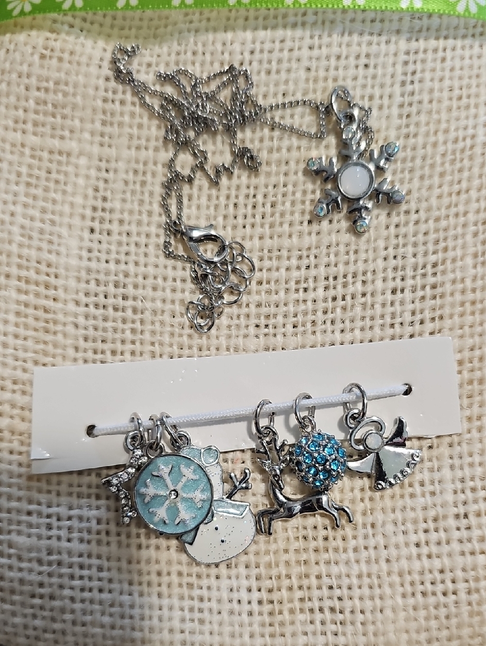 Playful Silver Holiday Charm Necklace with Light Blue Accents